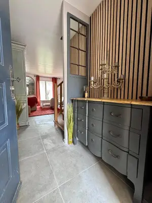 a bathroom with a toilet and a window at Le clos de l’artichaut in Eyguières