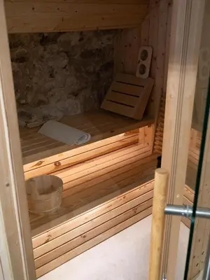 a wooden inside of a sauna with a sink at Le Spacieux - Un Voyage en Provence- Offre de lancement in Aix-en-Provence