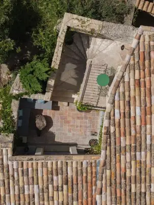 an overhead view of a stairway with a building at Maison d'exception au cœur de Goult in Goult