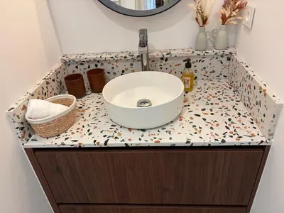 a bathroom counter with a sink and a mirror at Le petit Auzon in Mazan
