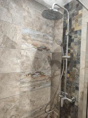 a shower with a glass door in a bathroom at Bon Pasteur in Aix-en-Provence