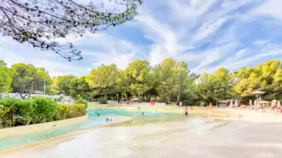 a rendering of a park with people in the water at appartement pont royal in Mallemort