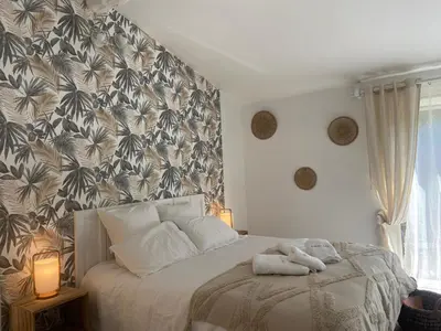 a bedroom with a bed with two towels on it at Studio Estrella - Studio 2 personnes - Domaine Astra, Grans in Grans
