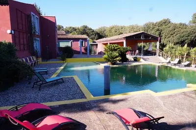 a swimming pool in front of a house at Studio Soléa - Studio 2 - 4 personnes - Domaine Astra, Grans in Grans