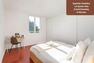 a white bedroom with a bed and a desk at Le Saint Sauveur - Centre Ville - Calme - Lumineux in Aix-en-Provence