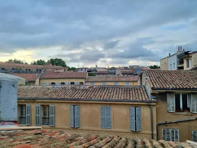a view of a city with roofs and buildings at Studio lumineux clim - centre ville in Aix-en-Provence