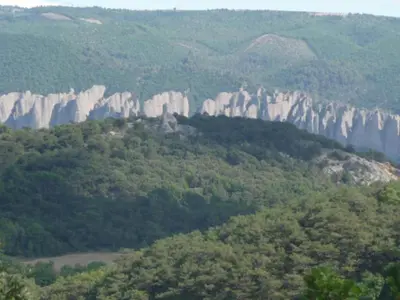 a view of a mountain with trees and rocks at Holiday Home Provence with Pool in Céreste