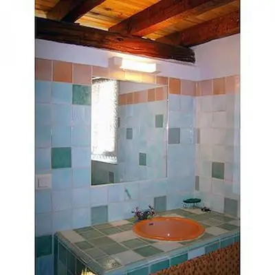 a bathroom with a sink and a mirror at Location avec piscine Roussillon LS2-91 in Roussillon