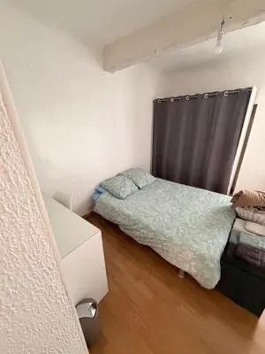 a small bedroom with a bed and a window at T2 lumineux hyper centre Aix en Provence à quelques metres du Cours Mirabeau pour 1 à 5 personnes in Aix-en-Provence