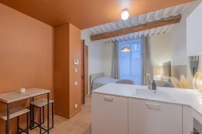 a kitchen with a sink and a counter top at Appartement Belle Lettre 1 in Aix-en-Provence