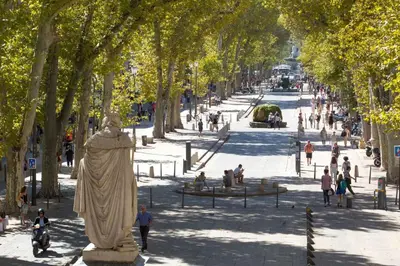 a statue of a woman in a park with trees at Chez Monique - Appartement T2 au cœur du centre ville historique - proche Mairie et Cardeurs in Aix-en-Provence
