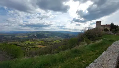 a view of a hill with a castle in the distance at Le Cosy Luberon - Viens in Viens