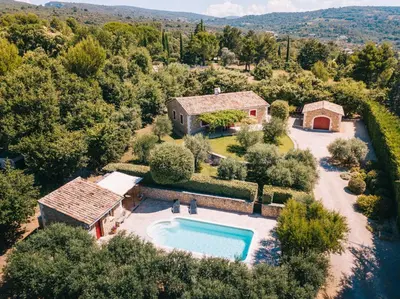 an aerial view of a house with a swimming pool at Location vacances maison piscine LIOUX LS2-92 in Lioux