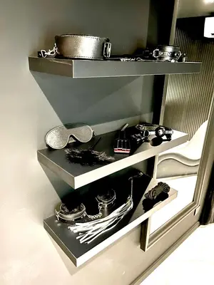 a shelf in a kitchen with some items on it at BDSM TANTRA Love Room Salon-de-Provence in Salon-de-Provence
