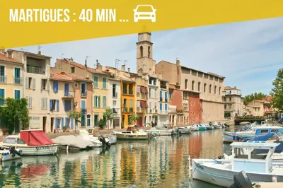a bedroom with a bed with towels on it at EDEN l Jardin, Bbq, Duplex l Parking Gratuit & Super Wifi l Vue Panoramique Sainte-Victoire in Aix-en-Provence