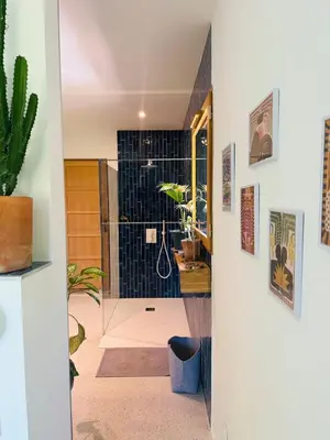 a bathroom with a shower with a glass door at House with heated swimming pool and breathtaking views of the Luberon in Robion en Luberon