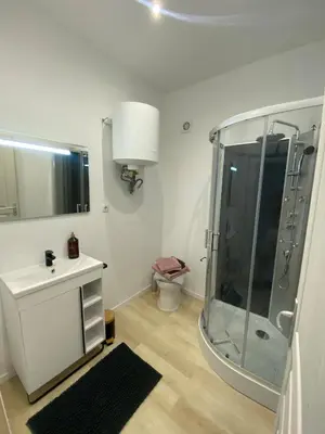 a bathroom with a shower and a sink and a toilet at Studio en Provence avec piscine in La Barben