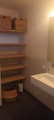 a bathroom with a sink and a mirror and a sink at fleur de gaïa chambres d'hôtes in Mazan