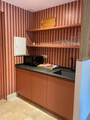 a kitchen with a sink and a counter top at Mazet Arlequine in Eygalières