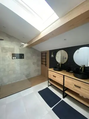 a bathroom with a sink and a mirror at La Bastide Mas in Le Thor