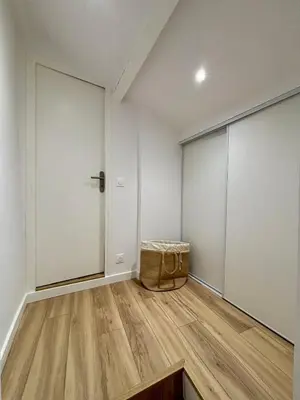 an empty room with a door and wooden floors at Magnifique studio centre d'Aix & Cours Mirabeau in Aix-en-Provence