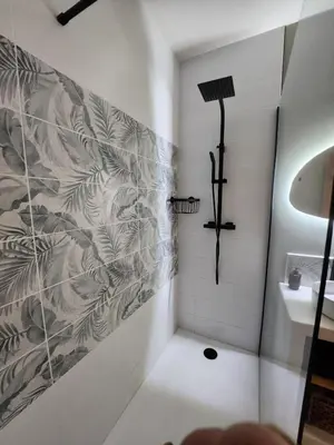 a bathroom with a shower and a sink at Escapade sur la Sorgue in LʼIsle-sur-la-Sorgue