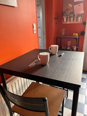 a table with two cups on top of it at Le Paradis au centre du Vaucluse in Saumane-de-Vaucluse