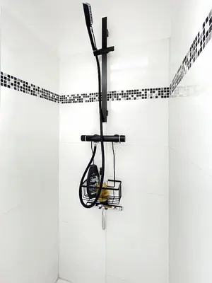 a shower with a glass door in a bathroom at Sejour paisible au Thor in Le Thor