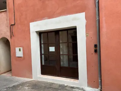 a door on the side of a building at Apartment Roussillon village Ocre Air conditioning in Roussillon