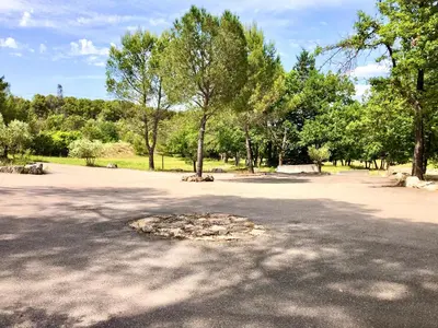 a large parking lot with a circle in the middle at Villa Provençale - Rognes campagne d'Aix en Provence in Rognes