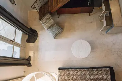 a room with two baskets hanging on the wall at Le Mas de Cink in Saint-Saturnin-les-Apt