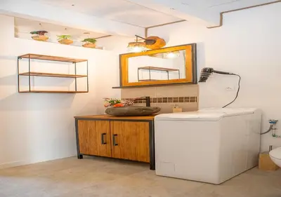 a bathroom with a shower and a sink and a refrigerator at Nature&détente au pied du Mont Ventoux parking privé gratuit in Carpentras