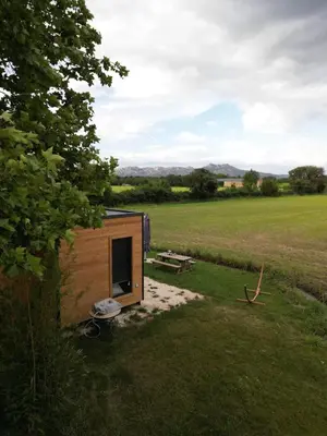 a tiny house in the middle of a field at Lodge en Provence in Mouriès