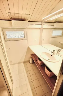 a bathroom with a sink and a window at L'Observateur in Aix-en-Provence