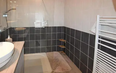 a bathroom with a sink and a bath tub at Lovely Home In Carpentras With Wifi in Carpentras