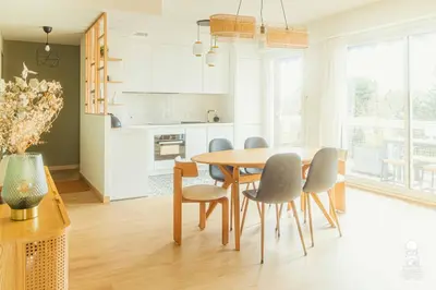 a kitchen and dining room with a table and chairs at Le Cézanne in Aix-en-Provence