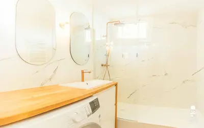 a bathroom with a sink and a shower at Le Cézanne in Aix-en-Provence