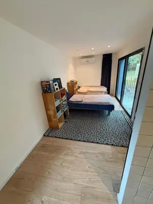 a bedroom with a bed and a window at Maisonnette in Aix-en-Provence