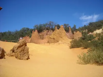 a person standing in a desert with some rocks at Lou pichoun studio au coeur d'un village provençal in Gargas