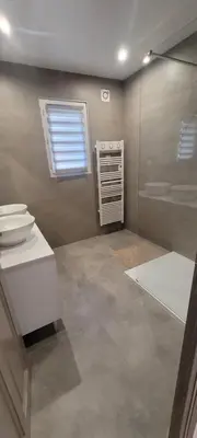 a bathroom with a toilet and a sink and a shower at Charming villa with a pool in Cadenet