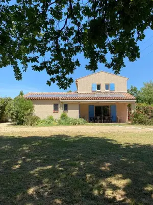 a large house with a large yard in front of it at Villa climatisée dans Domaine privé Aix en Provence in Aix-en-Provence