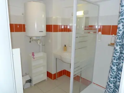 a small bathroom with a sink and a shower at Le Clos d'Aix Célony studio 9 parking in Aix-en-Provence