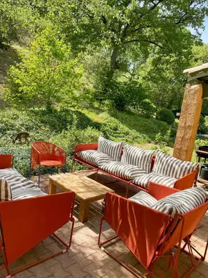 a group of chairs and a table and tables and chairs at Peaceful Retreat In The Heart Of Luberon in Roussillon