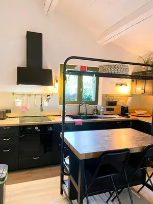 a kitchen with a loft bed in a kitchen at Peaceful Retreat In The Heart Of Luberon in Roussillon