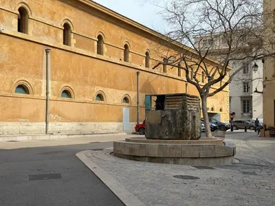 a large building with a tree in front of it at Chic et Cosy, Hyper centre in Aix-en-Provence