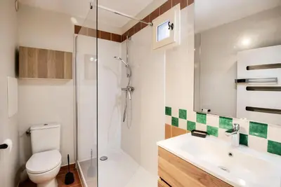 a bathroom with a shower and a toilet and a sink at Village Pont Royal en Provence - maeva Home - Maison climatisée 4 pièces 6 personnes - Sélection - super Home MAE-0411 in Mallemort