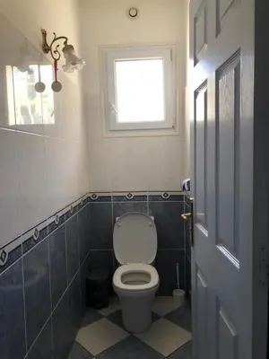 a bathroom with a toilet and a window at Jolie studio en Provence! in Pierrevert