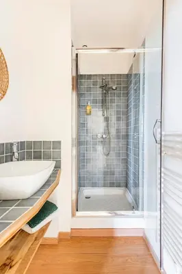 a bathroom with a shower and a sink at Mas de 190m2 Climatisé avec Piscine et Cuisine d'été - 10 pers in La Fare-les-Oliviers