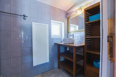 a bathroom with a sink and a mirror at Domaine Manon en Luberon privatisé - 22 couchages in Lagnes