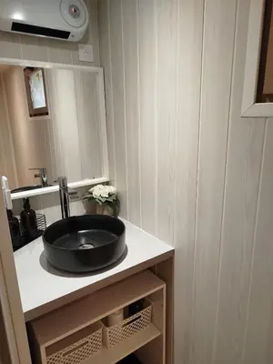 a bathroom with a black sink on a counter at Charmant Appartement en Provence in Caromb